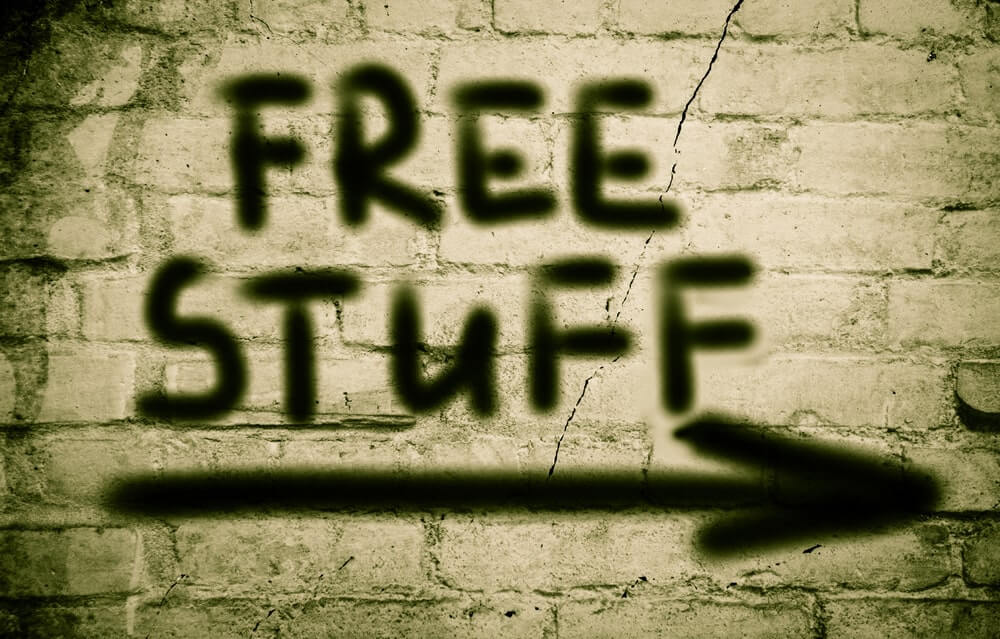 graffiti on wall that says free stuff