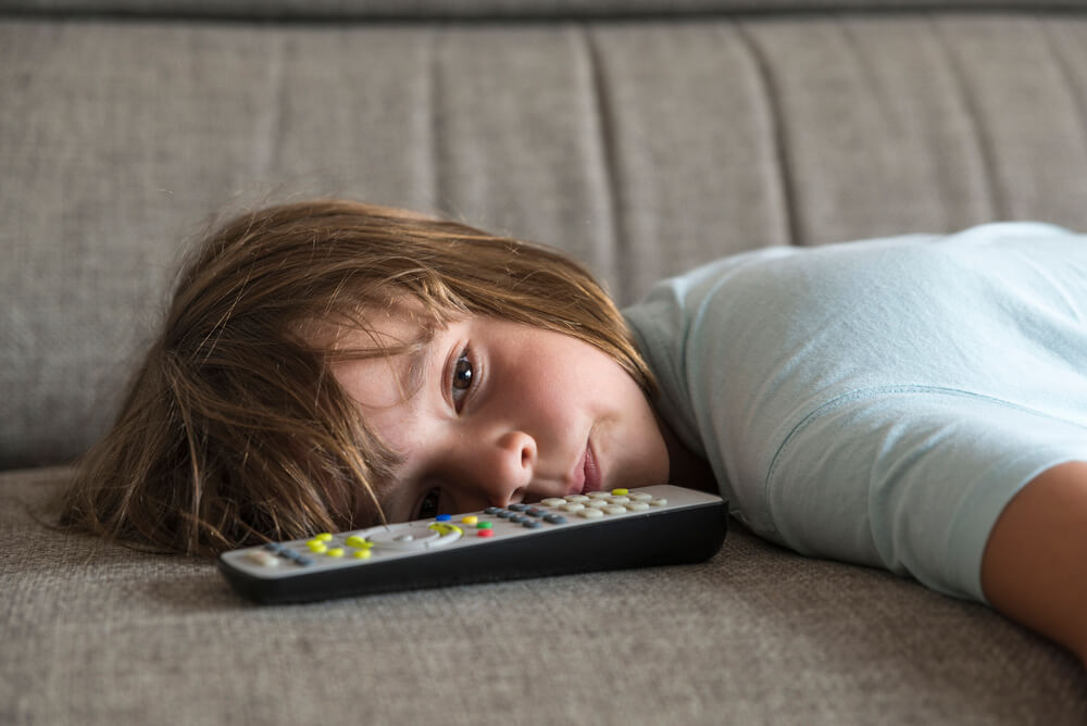 little girl watching tv