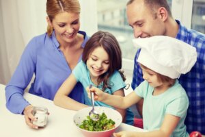 parents teaching children to cook